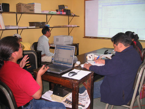 B’alam Mateo-Toledo (left) works with team at OKMA, Antigua, Guatemala
